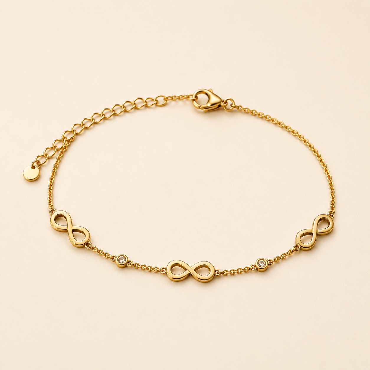 Infinity Charm Gold Bracelet – Timeless Elegance