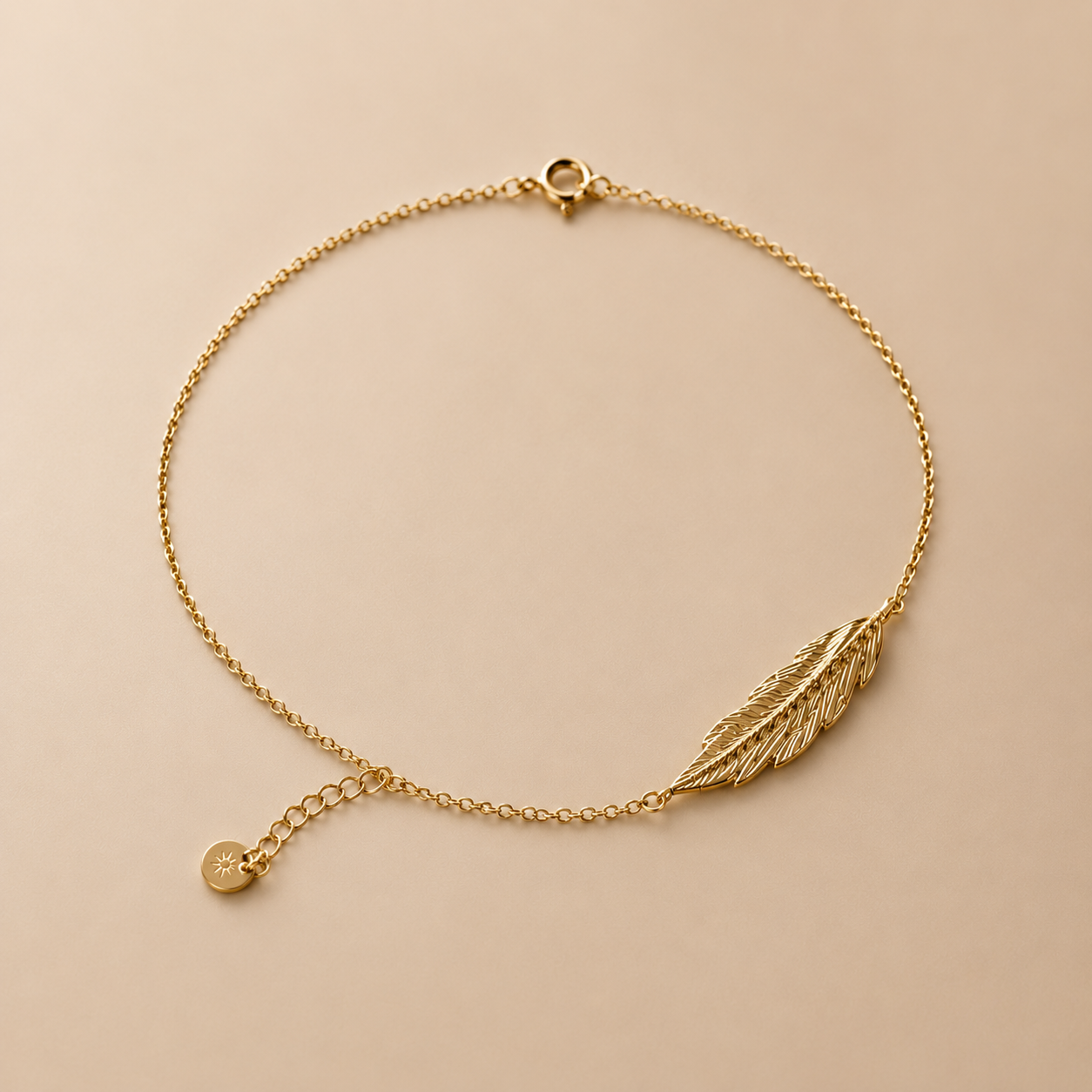 Golden Feather Charm Bracelet – Elegant Gold-Tone Minimalist Jewelry